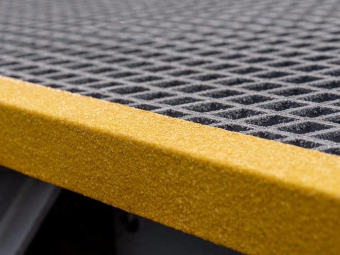 Yellow GRP Stair Nosing on Grating