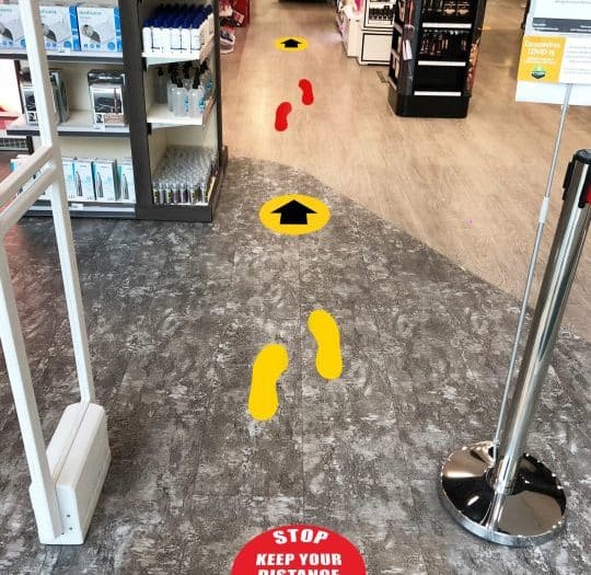 Social Distance Floor Graphic Marker In Shop